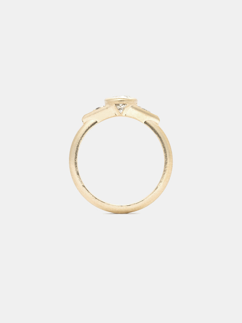 Shown: 0.5ct Faint Color center stone with 2mm sides stones in 14k yellow gold with smooth texture and signature matte finish.
