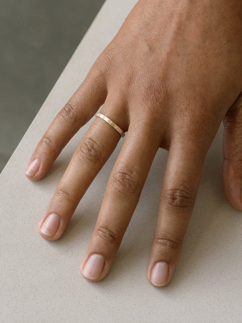 Shown: 14k yellow gold with antique hammer texture and signature matte finish.