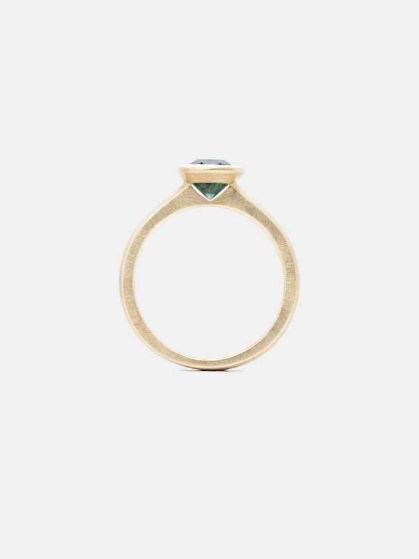Shown: 1.60ct mint oval Montana sapphire in 14k yellow gold with smooth texture and signature matte finish. 