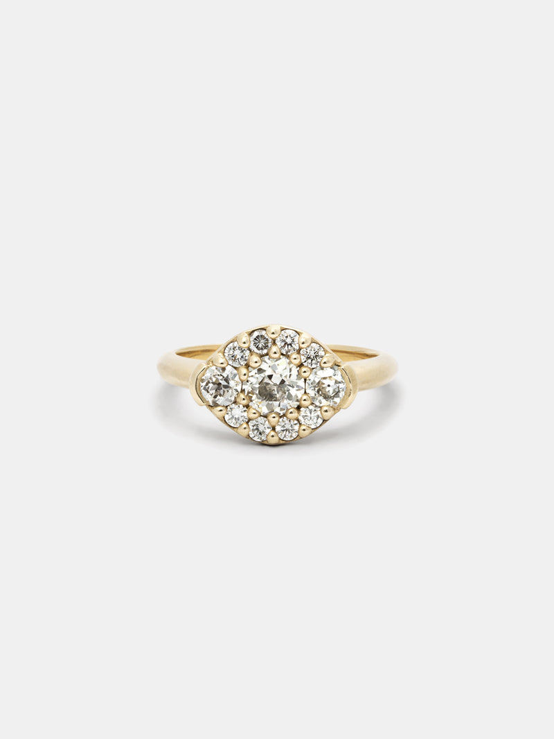Shown: 0.5ct antique diamond with (2) 3mm antique side stones and recycled diamond accents in 14k yellow gold with smooth texture and signature matte finish.