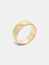 Wide Band in 14k yellow gold with organic texture and signature matte finish.